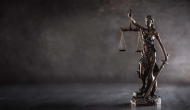 Statuette of Justice holding scales